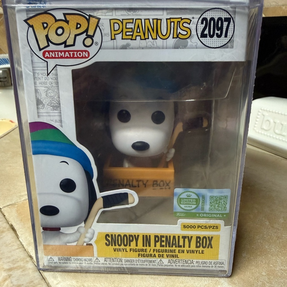 Funko Pop Peanuts Snoopy in penalty box.